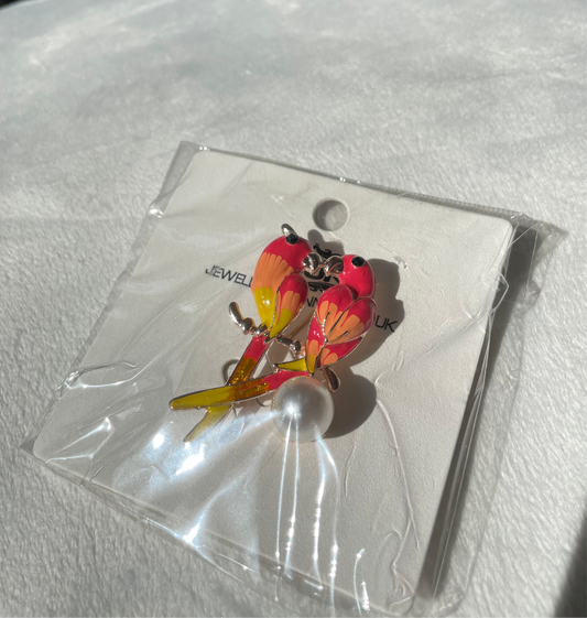 THE PARROT BROOCH